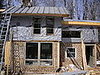 You can see the salvaged windows in this picture.